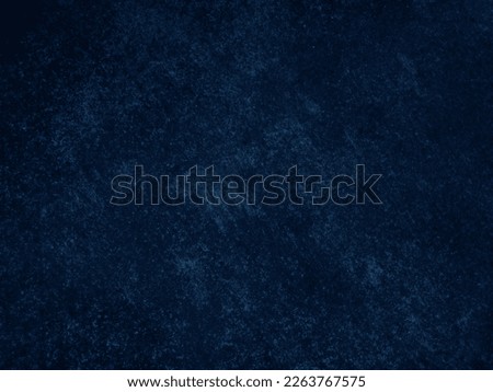 Dark rough cement wall background for graphic design or wallpaper. Grungy black and blue concrete texture in vintage style. The old plaster floor has a mysterious and terrifying age.