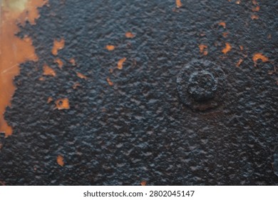 Dark Rust Texture with Weathered Bolt and Orange Paint