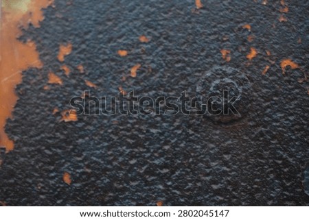 Dark Rust Texture with Weathered Bolt and Orange Paint