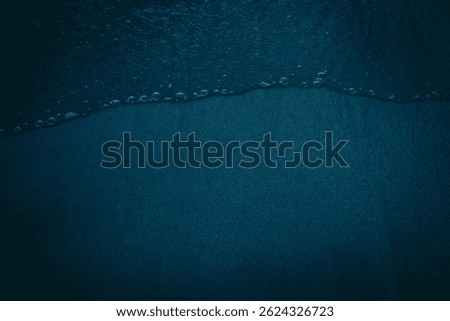 dark sandy beach, top view