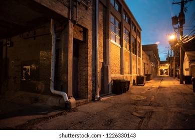 Dark And Scary Downtown Urban City Street Corner Alley With An E