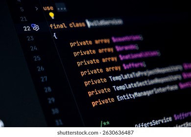 Dark screen view of PHP class definition with multiple private arrays declared for data encapsulation in object-oriented backend programming and modular code structure