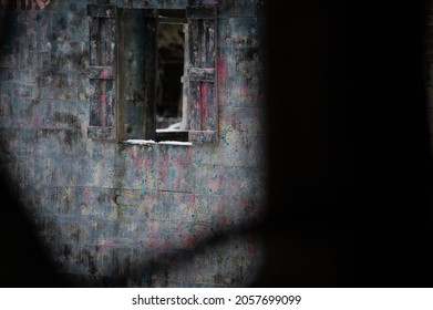 Dark Shadows On Wooden Exterior Wall Of Paint Ball Building Open Window With Shutters Wall Splattered  Paintball Paint Dark Shadows Light Cast On Building Wall Horizontal Format Room For Type Grunge 