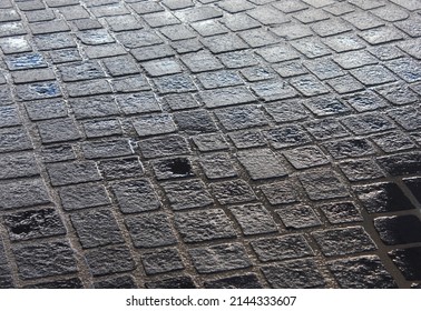 Dark And Shadowy Wet Cobble Stones