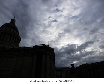 dark silhouette of the Pantheon building with cloudy evening sky
