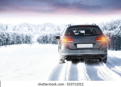 Dark Silver Car On Winter Road With Snow And Frost 