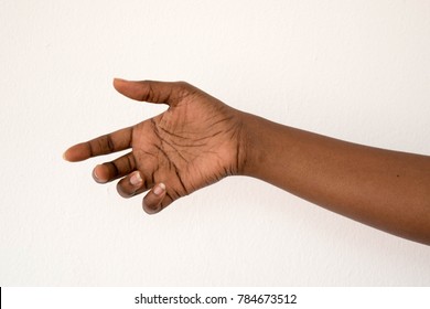 Dark Skin Woman's Hand Reaching For Hand Shake Isolated On White Background 