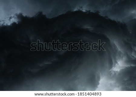 Dark sky during thunderstorm or dark clouds background