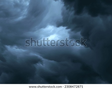 Dark sky during thunderstorm or dark clouds background