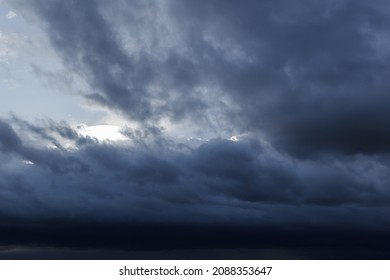 The Dark Sky With Heavy Clouds Converging And A Violent Storm Before The Rain.