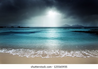 Dark Sky On The Beach Of La Digue Island, Seychelles