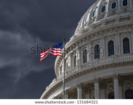 Dark sky over the US Capitol building dome in Washington DC.