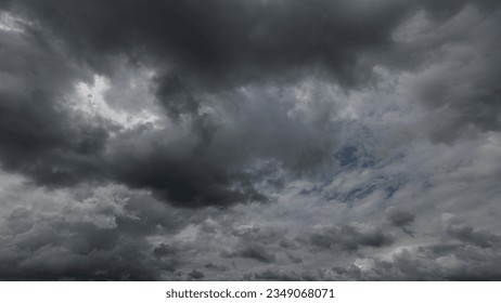  Dark sky with stormy clouds. Dramatic sky ,Dark clouds before a thunder-storm. - Powered by Shutterstock - Get 15% off with code: PIKWIZARD15
