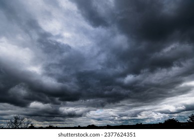 Dark sky with stormy clouds. Dramatic sky rain,Dark clouds before a thunder-storm.