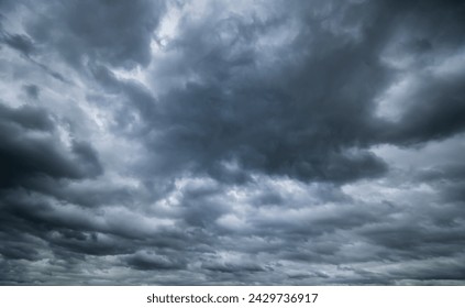 Dark sky with stormy clouds. Dramatic sky rain,Dark clouds before a thunder-storm. - Powered by Shutterstock - Get 15% off with code: PIKWIZARD15