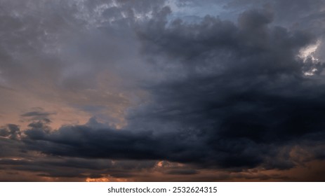 Dark sky with stormy clouds. Dramatic sky rain,Dark clouds before a thunder-storm.