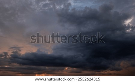 Dark sky with stormy clouds. Dramatic sky rain,Dark clouds before a thunder-storm.