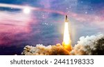 Dark space shuttle launch in the clouds with stars on background.Spaceship flight. Elements of this image furnished by NASA