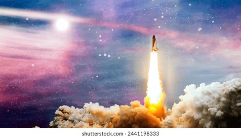 Dark space shuttle launch in the clouds with stars on background.Spaceship flight. Elements of this image furnished by NASA - Powered by Shutterstock