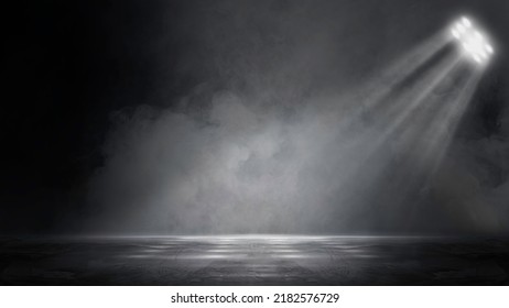 The dark stage shows, dark background, an empty dark scene, neon light, and spotlights The concrete floor and studio room with smoke float up the interior texture for display products - Powered by Shutterstock