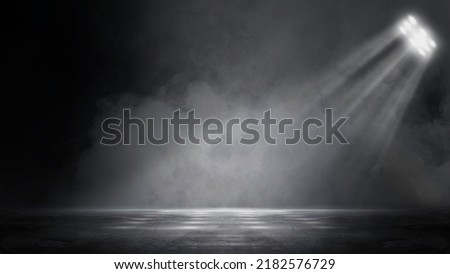 The dark stage shows, dark background, an empty dark scene, neon light, and spotlights The concrete floor and studio room with smoke float up the interior texture for display products