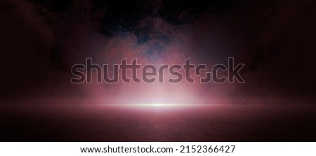 The dark stage shows, dark blue  background, an empty dark scene, neon light, spotlights The asphalt floor and studio room with smoke float up the interior texture for display products