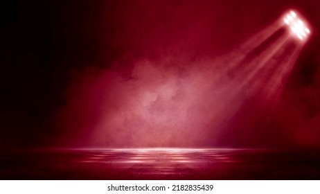 The dark stage shows, dark red background, an empty dark scene, neon light, and spotlights The concrete floor and studio room with smoke float up the interior texture for display products - Shutterstock ID 2182835439