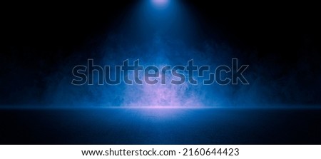 The dark stage shows, red background, an empty dark scene, neon light, and spotlights The asphalt floor and studio room with smoke float up the interior texture for display products.