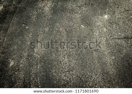Dark stone asphalt with grimey rustic filth.