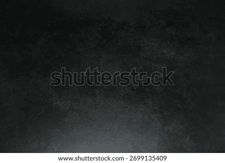 A dark stone gray surface featuring a fine, abrasive, and gritty texture with white-flecked mottling. This industrial look provides a strong, high-contrast base for products