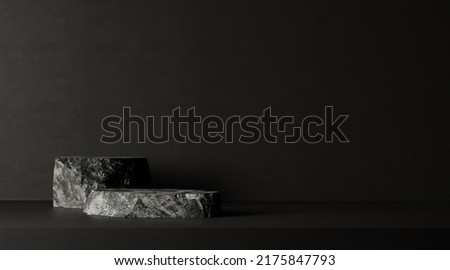 Dark stone podium for beauty and spa cosmetic brand product placement on black background wall. Luxury granite natural material and neutral aesthetic bathroom shelf. Minimal trendy mockup template.