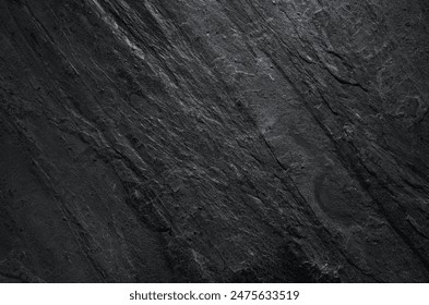 Dark stone texture background close up