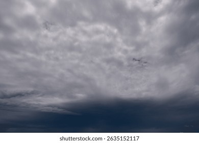 dark storm clouds with background,Dark clouds before a thunder-storm.	

