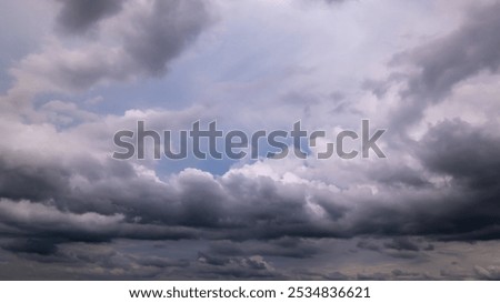 dark storm clouds with background,Dark clouds before a thunder-storm.	