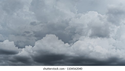 Dark storm clouds before rain used for climate background. Clouds become dark gray before raining. Abstract dramatic background.