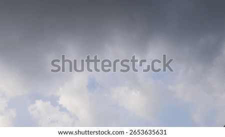 Dark storm clouds before rain. Dark cloudy sky background.