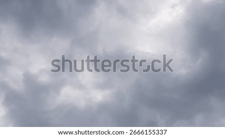Dark storm clouds before rain. Dark cloudy sky background.