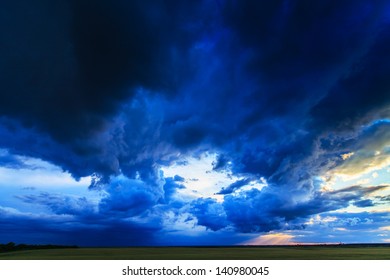Dark storm clouds on evening sky