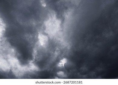 Dark storm clouds with rain, dark clouds before a thunder - storm