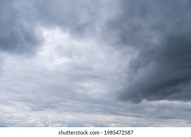 Dark storm clouds in the sky. Overcast sky before the rain. Dark gray dust clouds