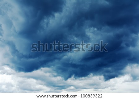 Dark storm clouds stretching towards the horizon