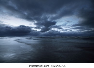 Dark Storm Sky Above The Baltic Sea, Waves And Water Splashes. Dramatic Cloudscape. Nature, Environment, Fickle Weather, Climate Change. Atmospheric Scenery. Panoramic View, Long Exposure