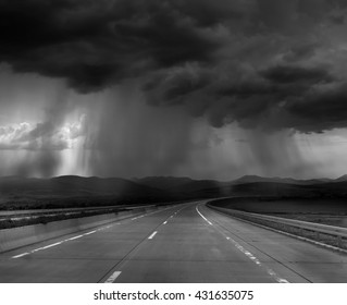 Dark Stormy Clouds On Road