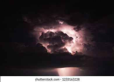 a dark stormy sky lit by lightning