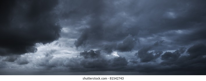 Dark stormy sky. Panoramic image.
