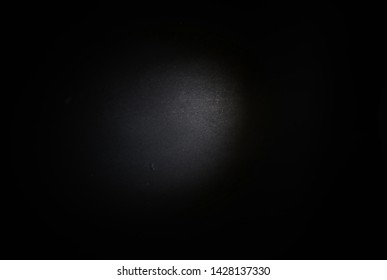 dark surface background with ray of light