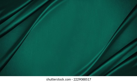 Dark teal green silk satin. Shiny smooth fabric. Soft folds. Luxury background with space for design. web banner. Flat lay, top view table. Birthday, Christmas, Valentine, New year. - Shutterstock ID 2229088517