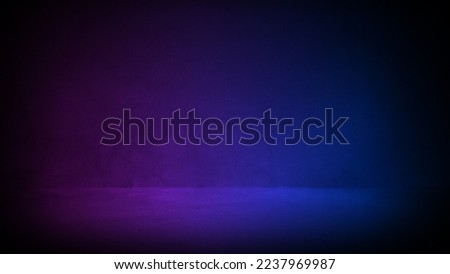 Dark three dimensional room with concrete wall and floor and pink and blue lighting. Empty modern urban background for mock up or product display