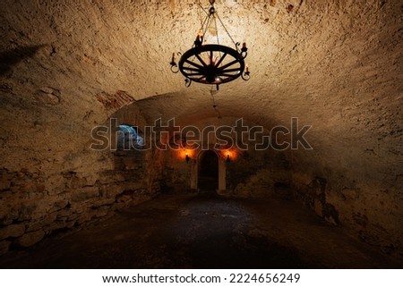 The dark tunnel in the catacomb of Pidhirtsi Castle, Lviv region, Ukraine. 