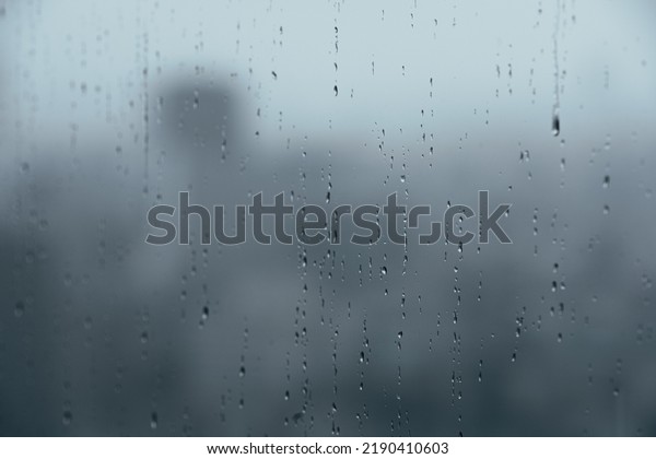 Dark urban landscape with
rain